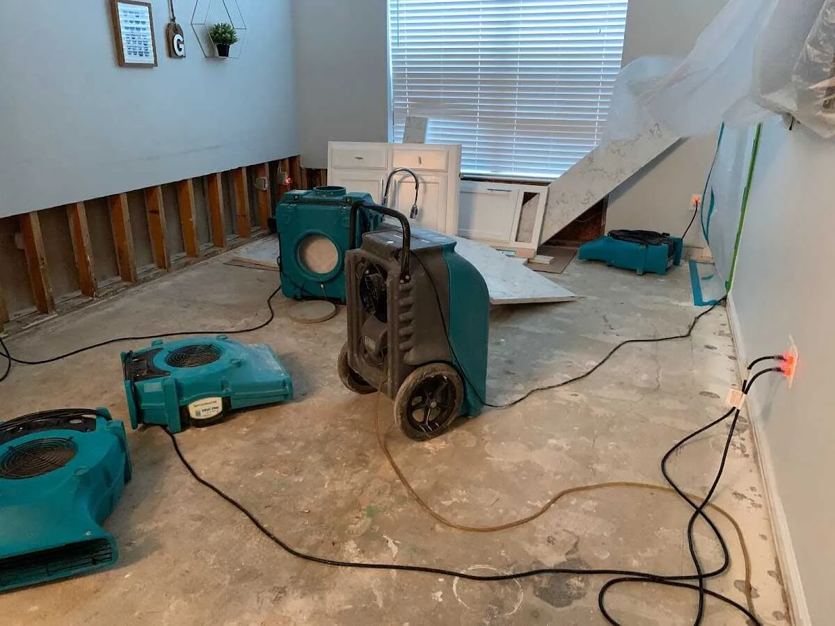 Dehumidifier in flood-cut room for Water Damage Restoration in Fort Smith