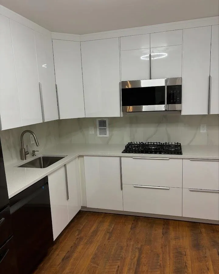 Restored kitchen with white cabinets after water damage in Fort Smith